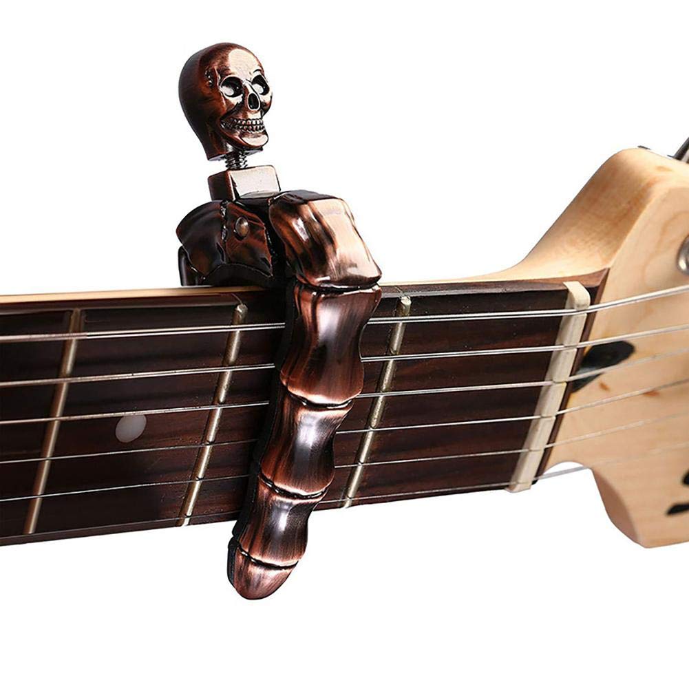 Musical Instrument Note - Kapodaster do gitary w kształcie czaszki,